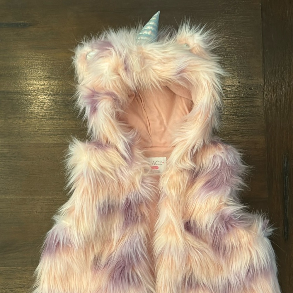 Beautiful little girls furry unicorn vest